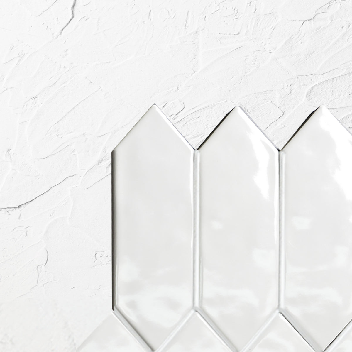 White Gloss Porcelain Glazed Ripple Surface Arrow 55x195mm tiles laid, wider view