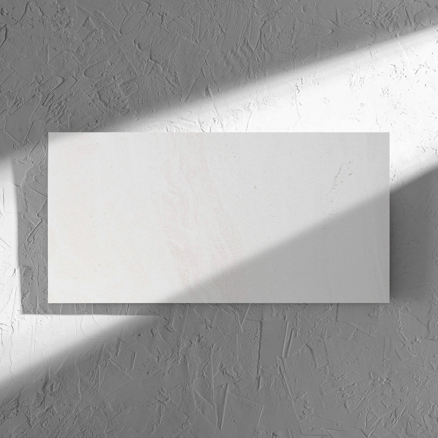 Argyle Stone Talco Lappato 300x600mm tile in soft natural window light, showing the tile surface