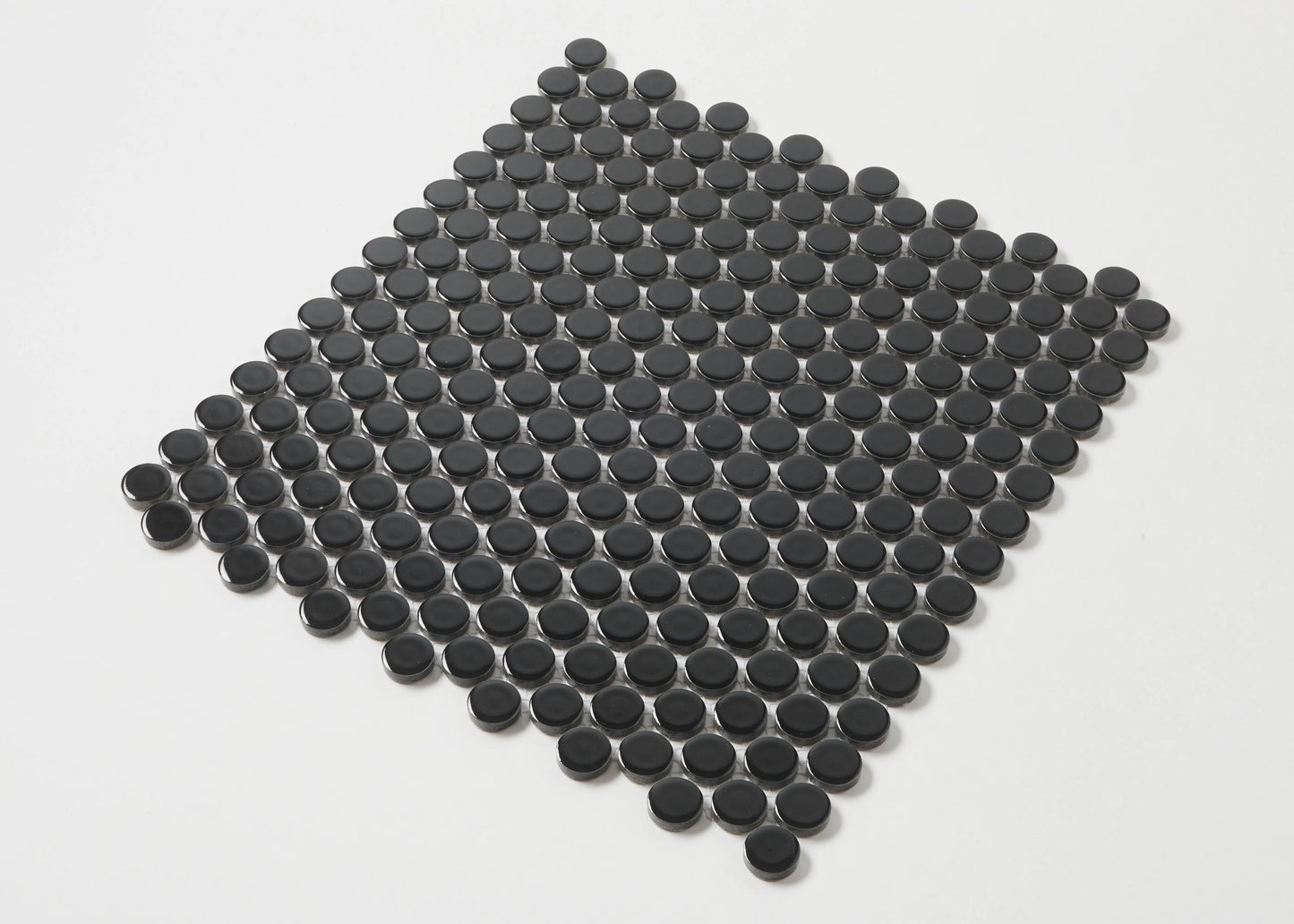 Black Gloss Diameter Glazed Porcelain Penny Round 19mm tiles arranged in a diamond-shaped mesh sheet, showing glossy circular black ceramic mosaic pieces on a white background.