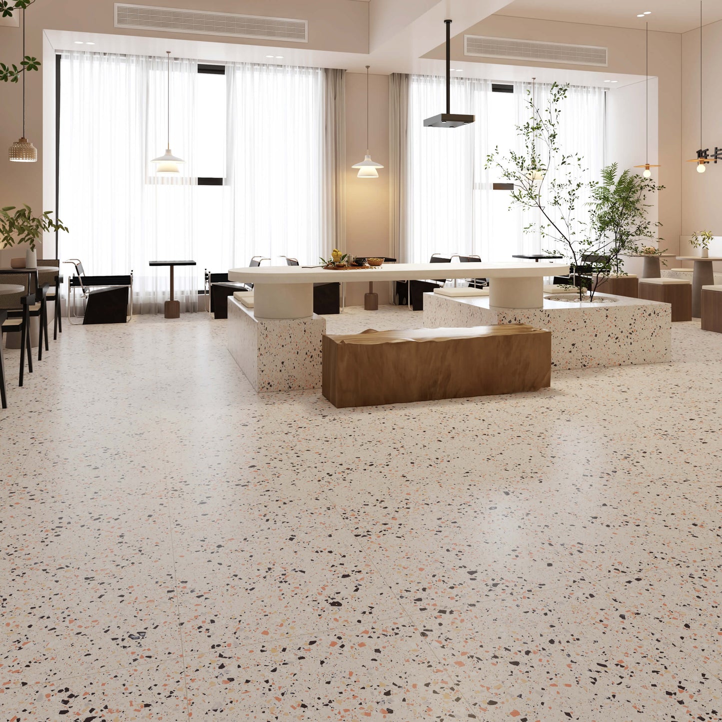 C Venice 600x600 Matt Beige Terrazzo Look Rectified tiles installed across a spacious modern café floor featuring a central communal table, terrazzo plinths, and pendant lighting.