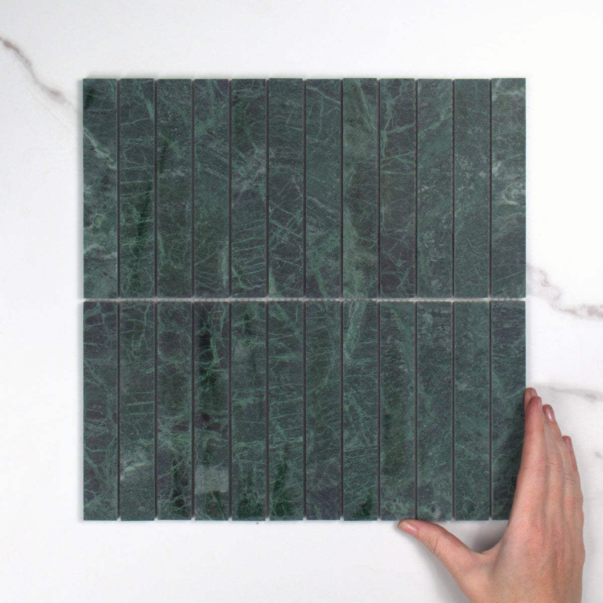 Elementa Verdi Alpi Finger Mosaic 23x148mm top view, hand for scale