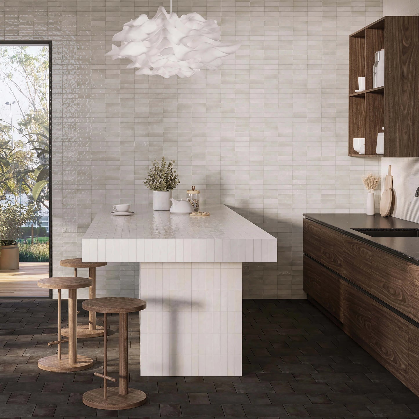 Mini Grey Glossy 50x150mm tiles covering a full kitchen wall and island, paired with dark wood cabinetry and a cloud-shaped pendant light.