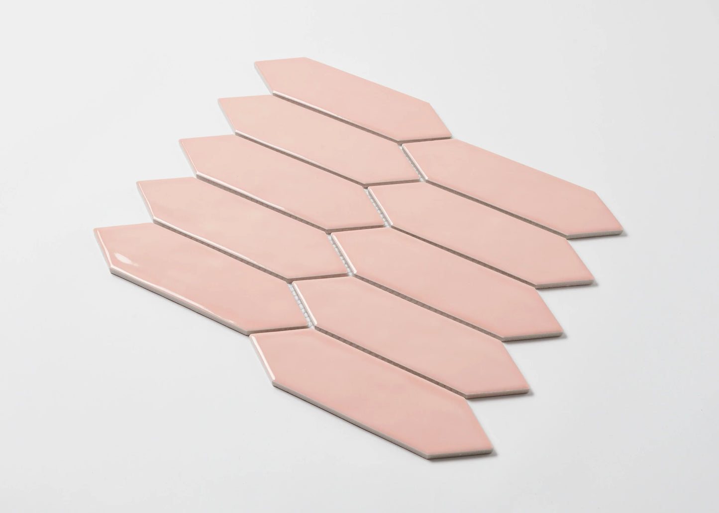 Pack shot of Salmon Pink Gloss Porcelain Glazed Ripple Surface Arrow 55x195mm tiles arranged in a diagonal fan layout showing glossy finish and elongated arrow shape.