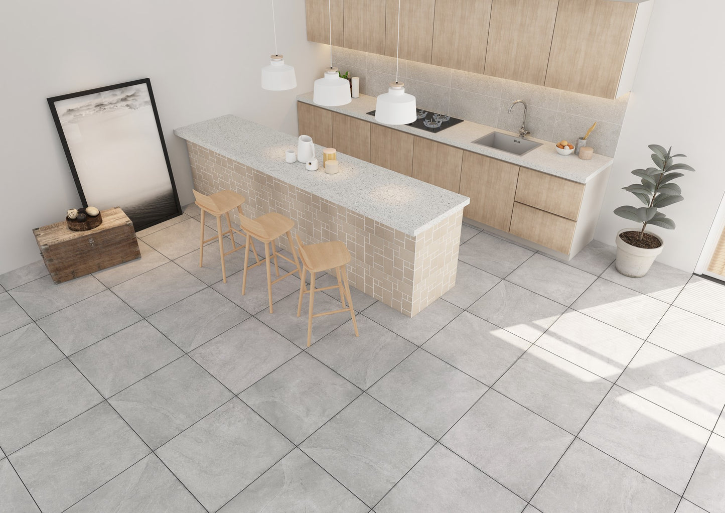 Stoneage Ice External 450x450mm light grey stone-look floor tiles installed in a modern kitchen with timber cabinetry, mosaic island bench, and pendant lights.