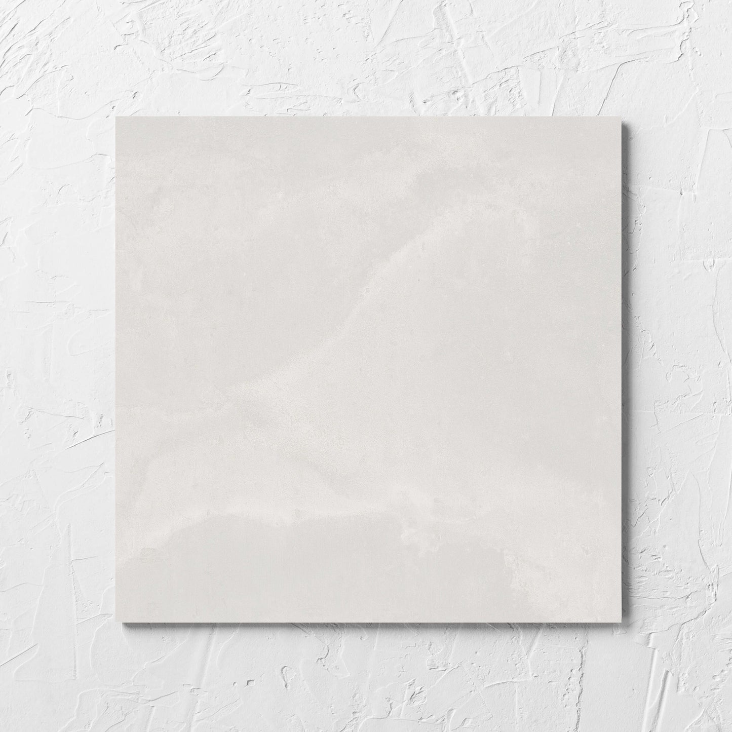 Thor White Matt 300x300mm tile laid flat on a white rendered wall, showing the matt surface