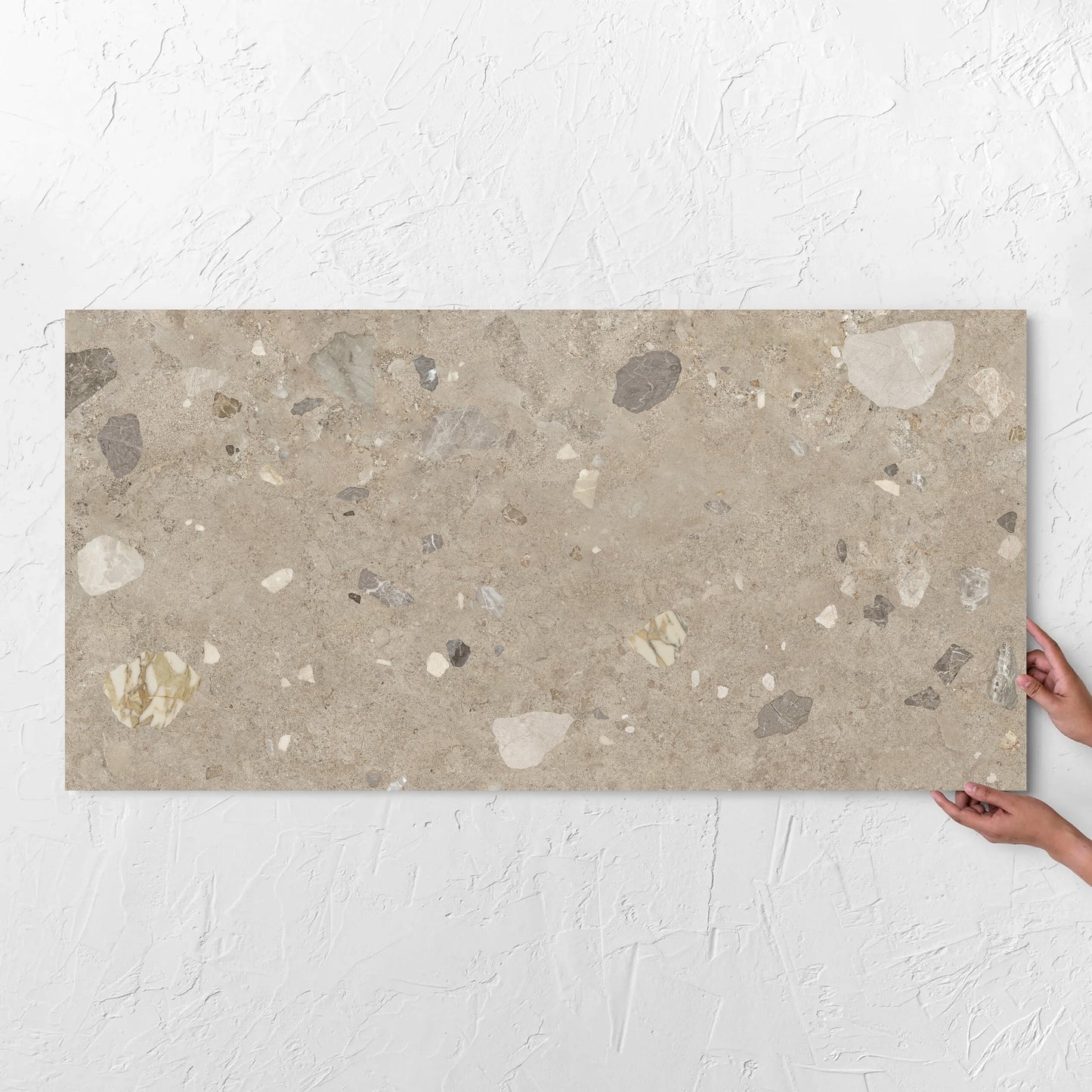 Brescia Iconic Grigio Premium Honed 600x1200mm tile with hands