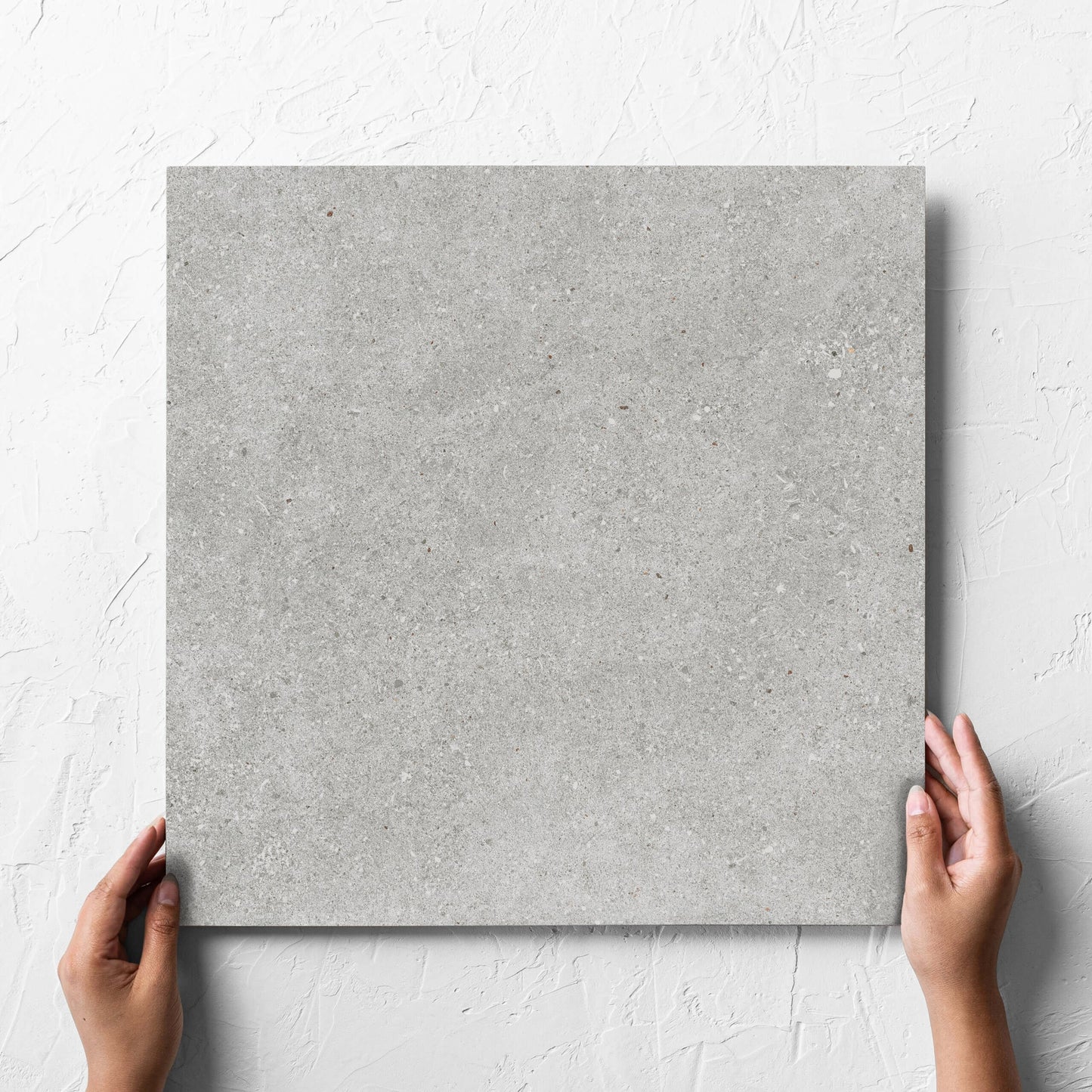 Serenity Concrete Grey In/Out 450x450mm hand 4