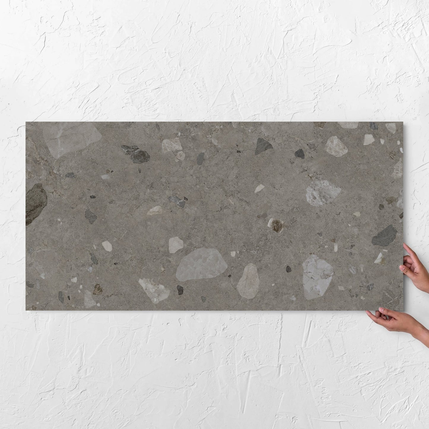 Brescia Iconic Grafite Premium Honed 600x1200mm tile with hands