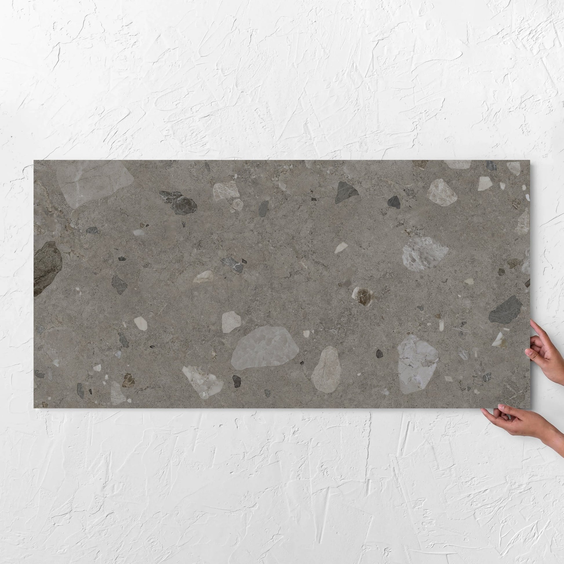Brescia Iconic Grafite Premium Honed 600x1200mm tile with hands