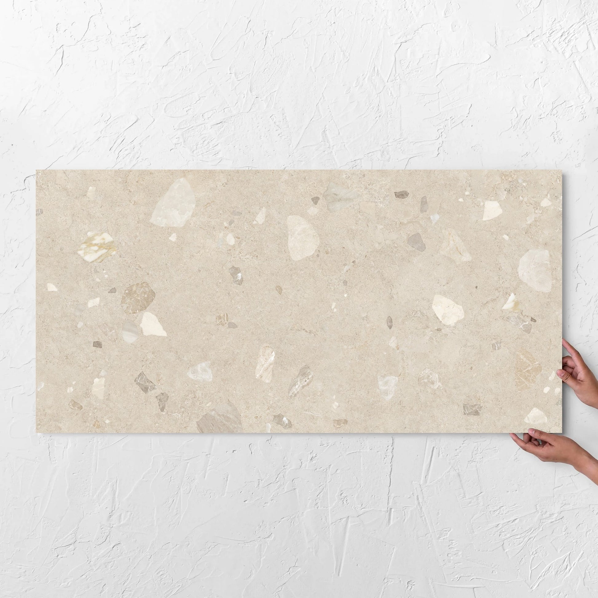 Brescia Iconic Ivory Premium Honed 600x1200mm tile with hands