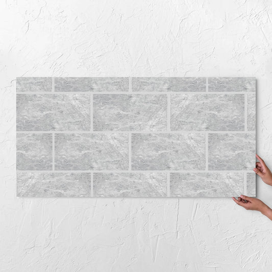 Antalya Silver Amber 600x1200mm tile with hands