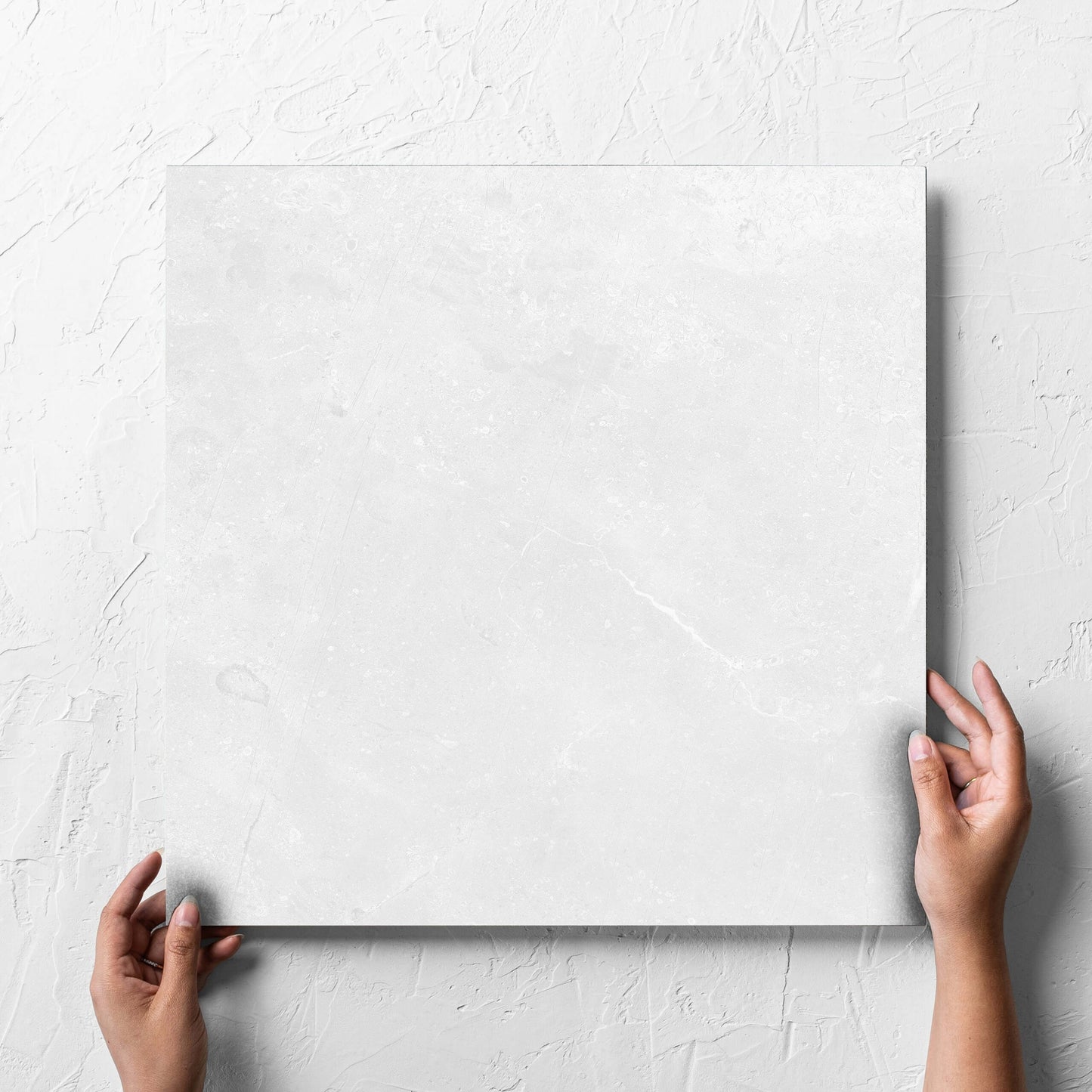Kashmir Bone Matt 450x450mm hand 2