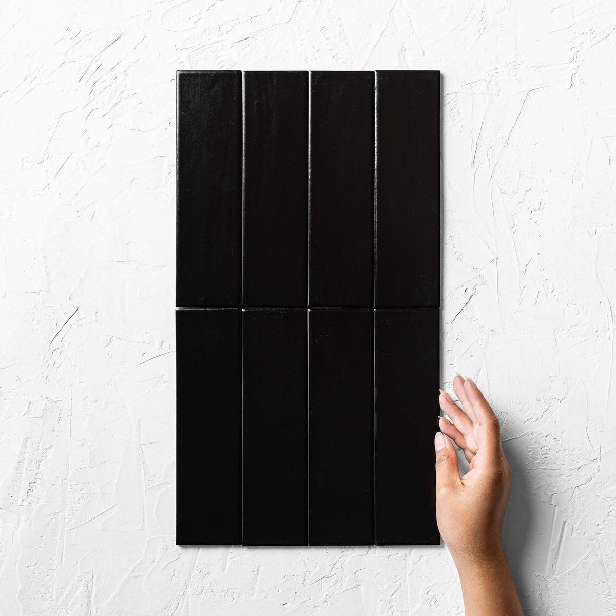 Brava Black Gloss 60x217mm tiles installed