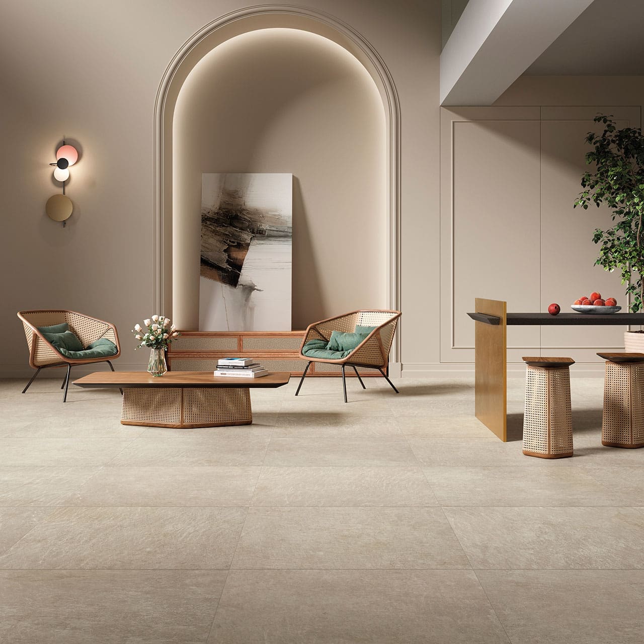 Absolute Clay 600x600mm porcelain floor tiles in a luxurious beige living room with rattan furniture, arched wall niche, and abstract artwork.