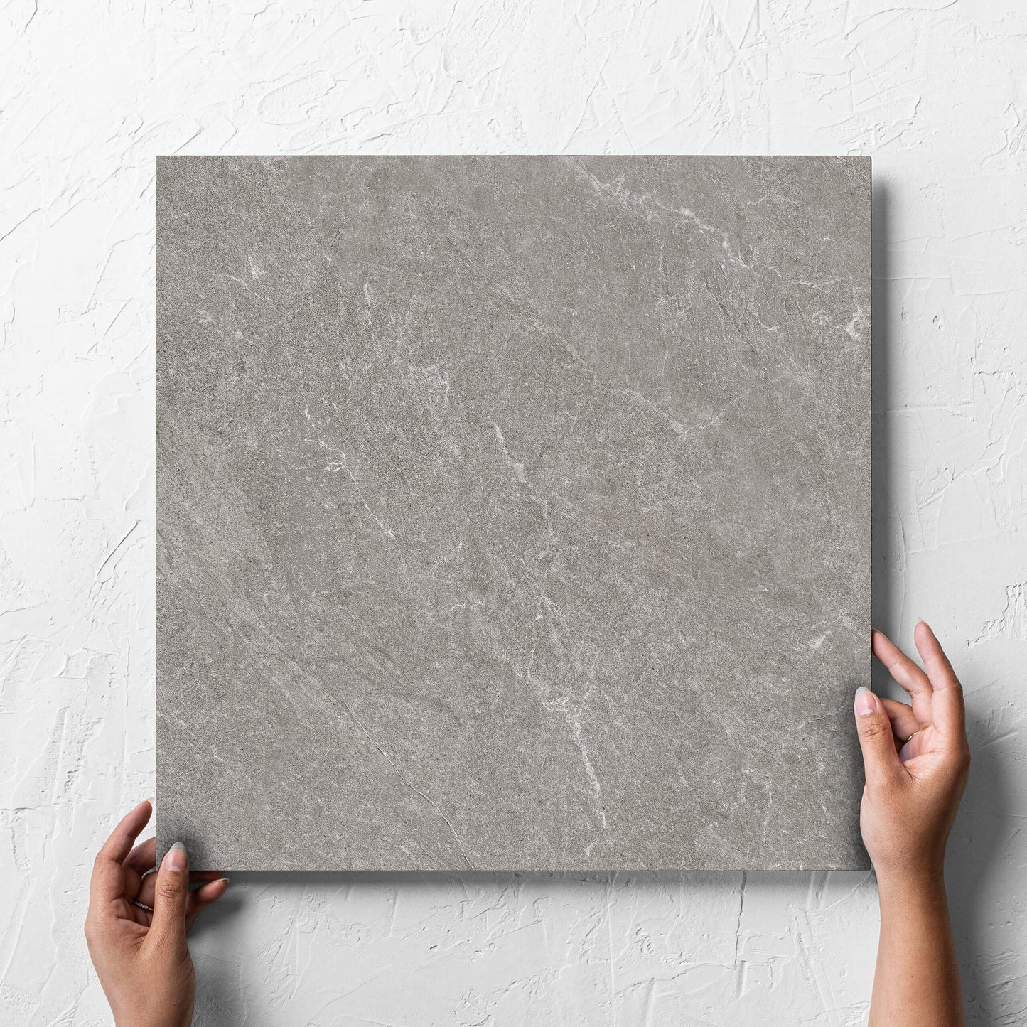 Brampton Charcoal Matt 450x450mm hand 2