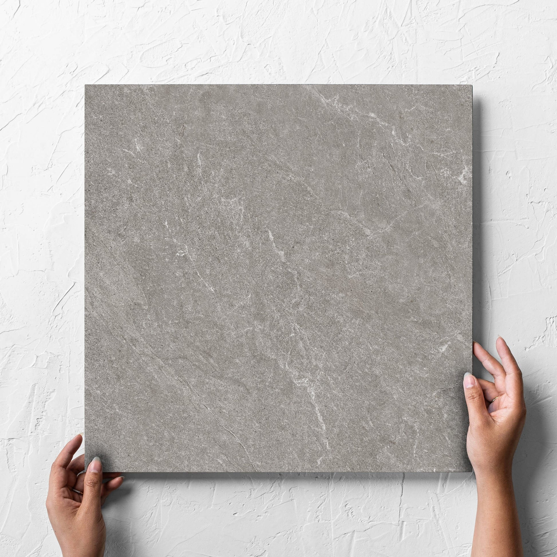 Brampton Charcoal Matt 450x450mm hand 2