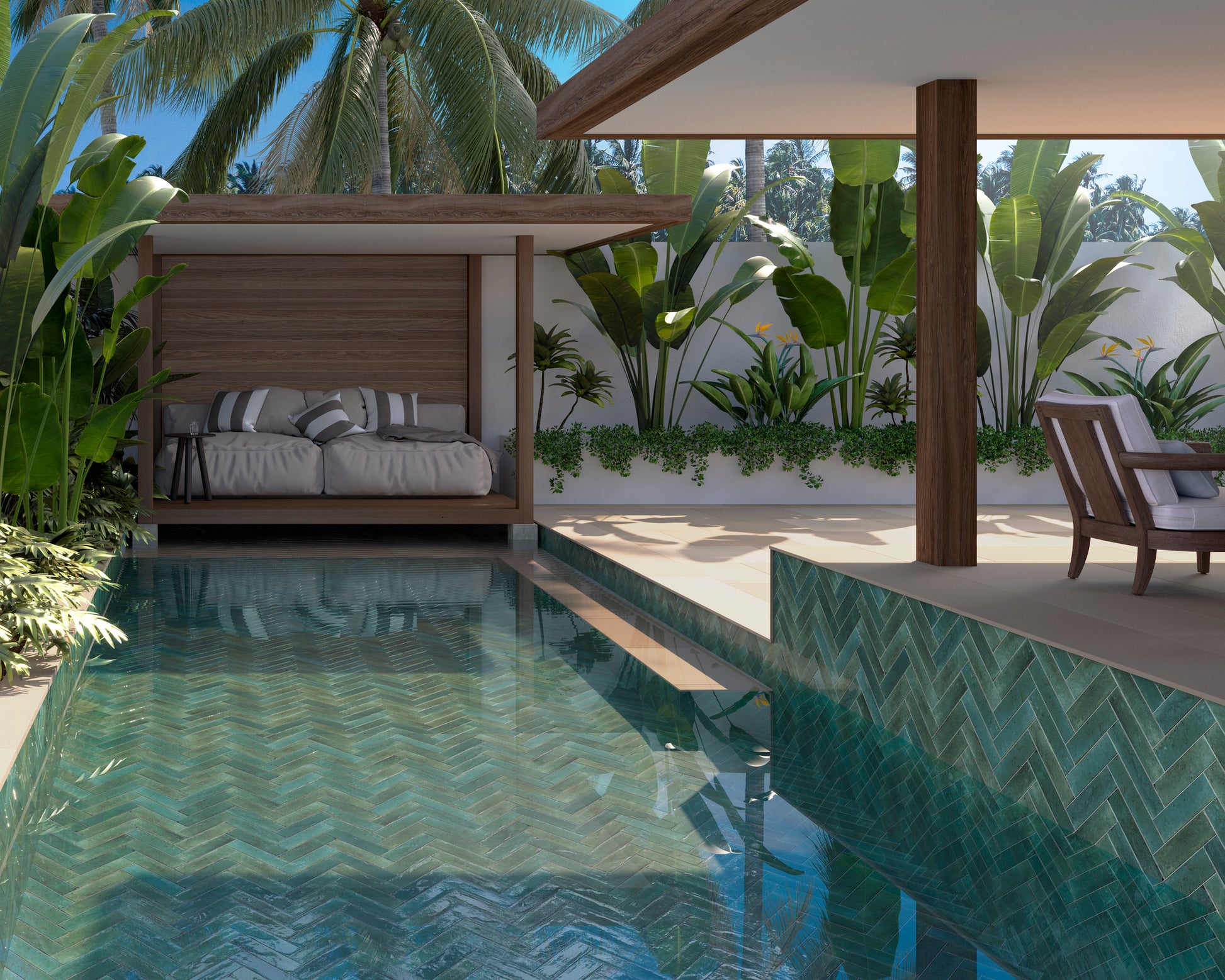 Agadir Selva 70x280mm green herringbone tiles lining a luxury tropical pool with a timber cabana daybed and lush palm garden surround.