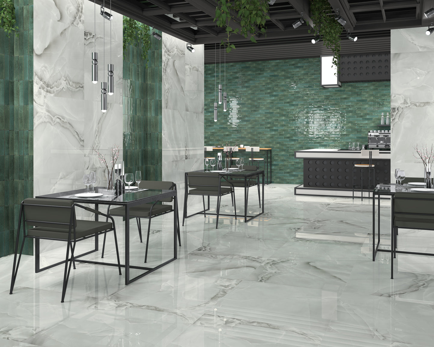 Agadir Selva 70x280mm glossy emerald green brick tiles installed as a feature wall in a contemporary restaurant with marble flooring and pendant lighting.