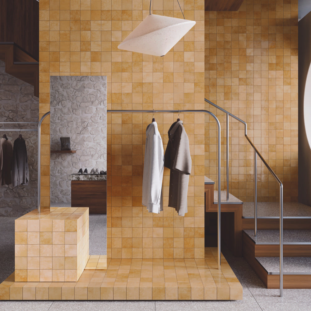 Alchemica Miele Gloss 100x100mm tiles in a shop interior