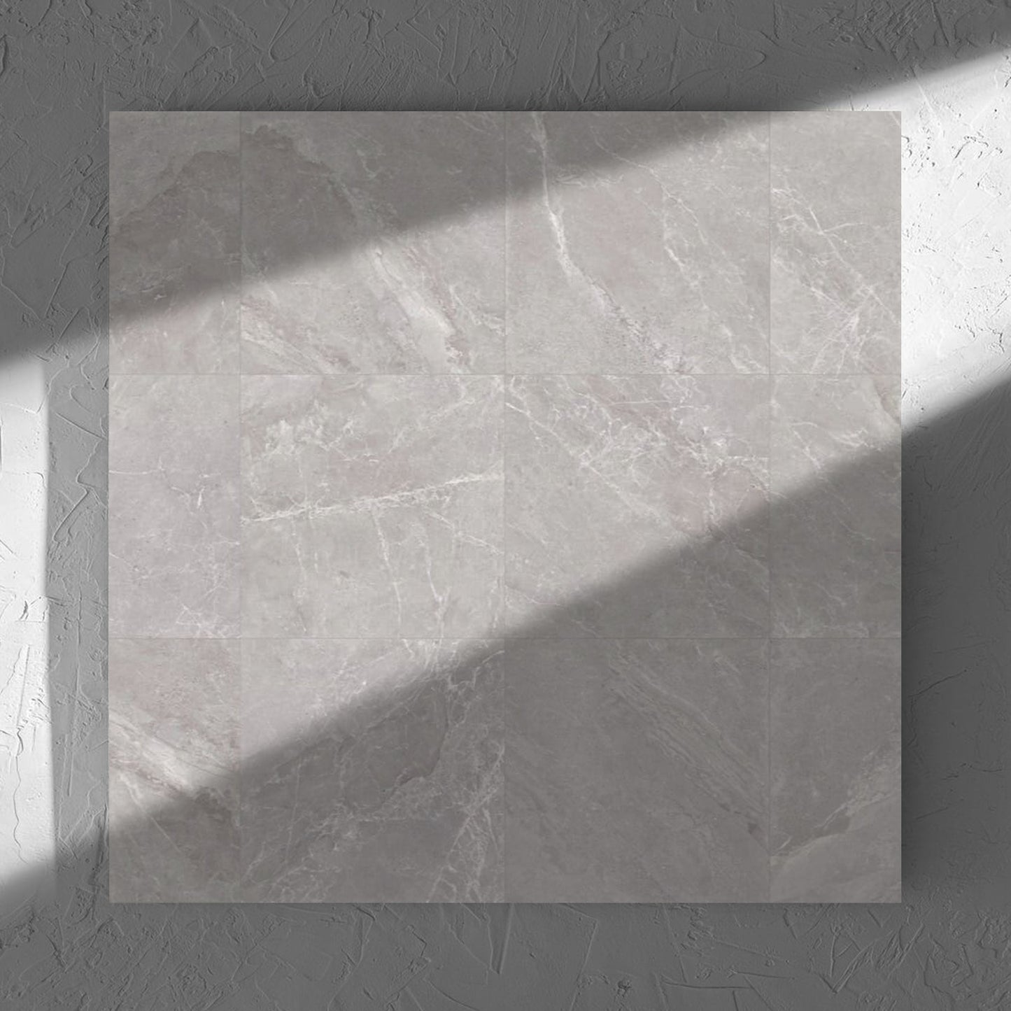 Alpen Stone Grey Lappato 600x600mm tile in soft natural window light, showing the tile surface
