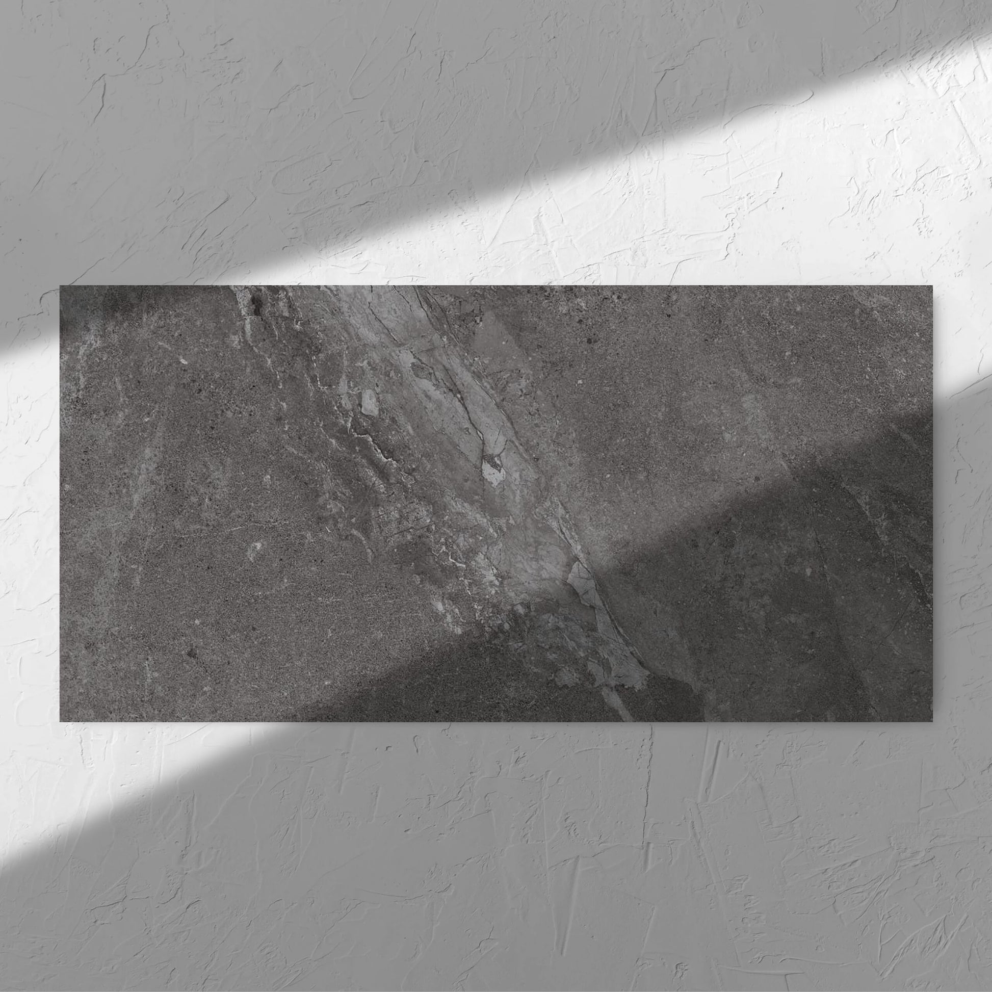 Alpen Stone Smoke 600x1200mm tile in soft natural window light, showing the tile surface