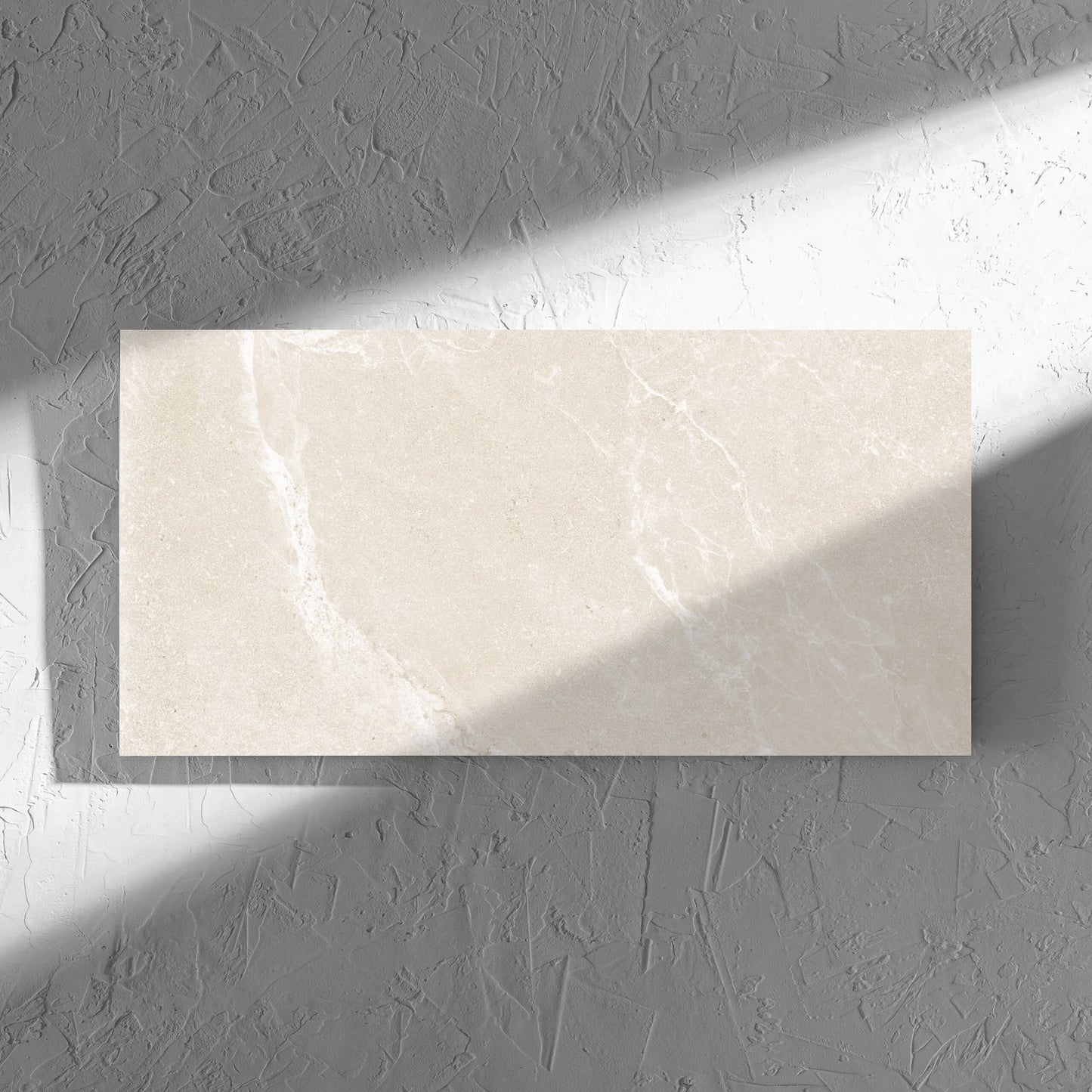Alpen Stone Warm 300x600mm tile in soft natural window light, showing the tile surface