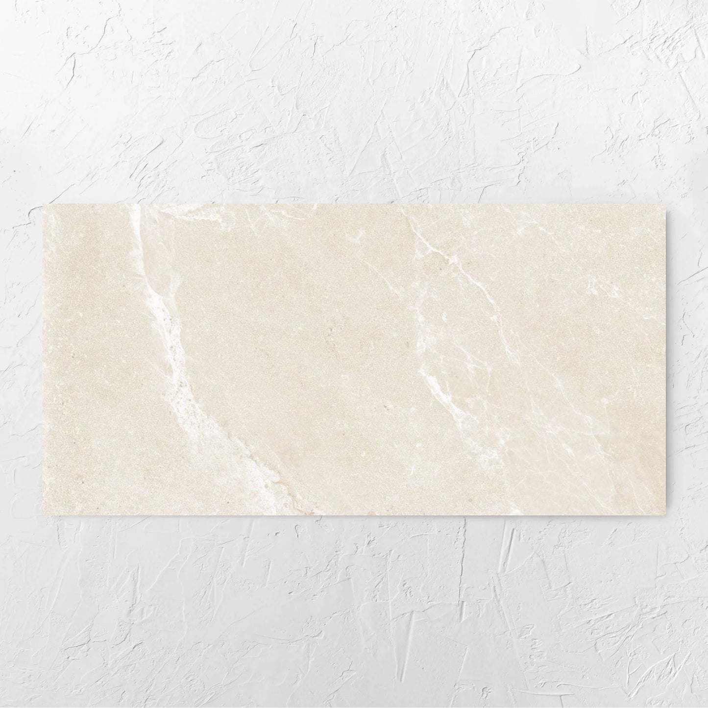 Alpen Stone Warm Lappato 600x1200mm tile laid flat on a white rendered wall, showing the tile surface