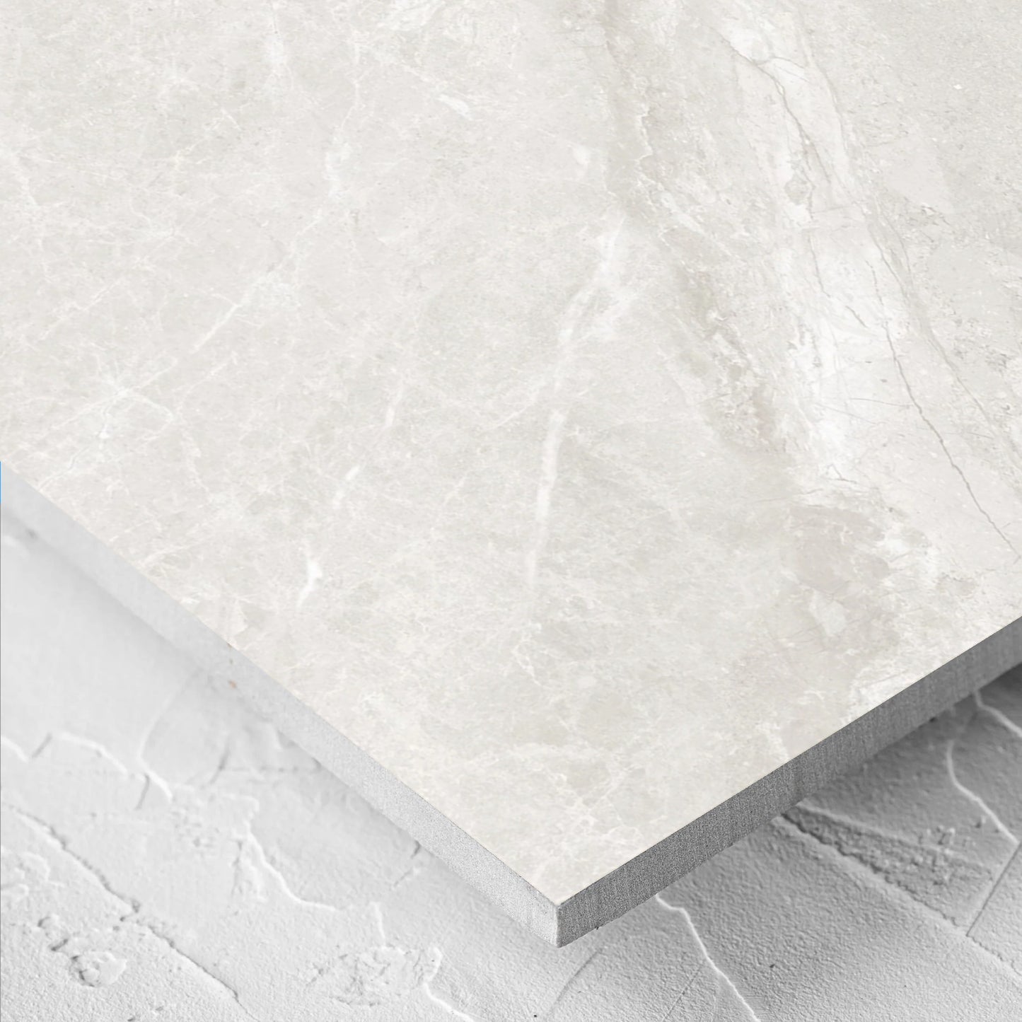 Close-up of the Alpen Stone White 600x1200mm tile showing the tile surface in detail
