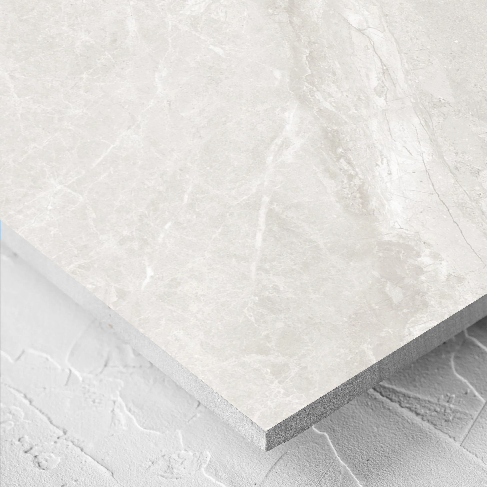 Close-up of the Alpen Stone White 600x1200mm tile showing the tile surface in detail