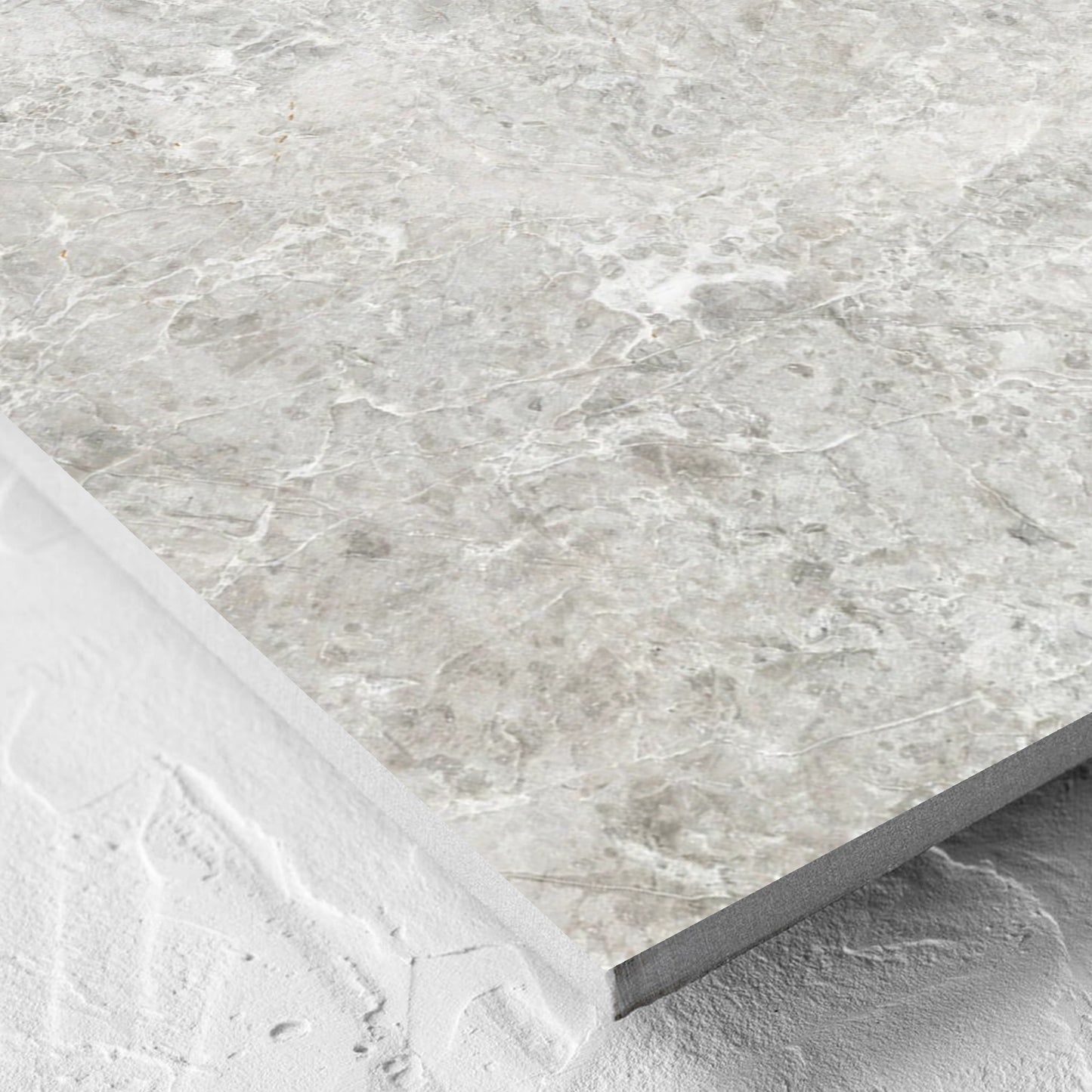 Corner close-up of the Antalya Beige Amber 600x600mm tile showing the matt surface and the edge profile