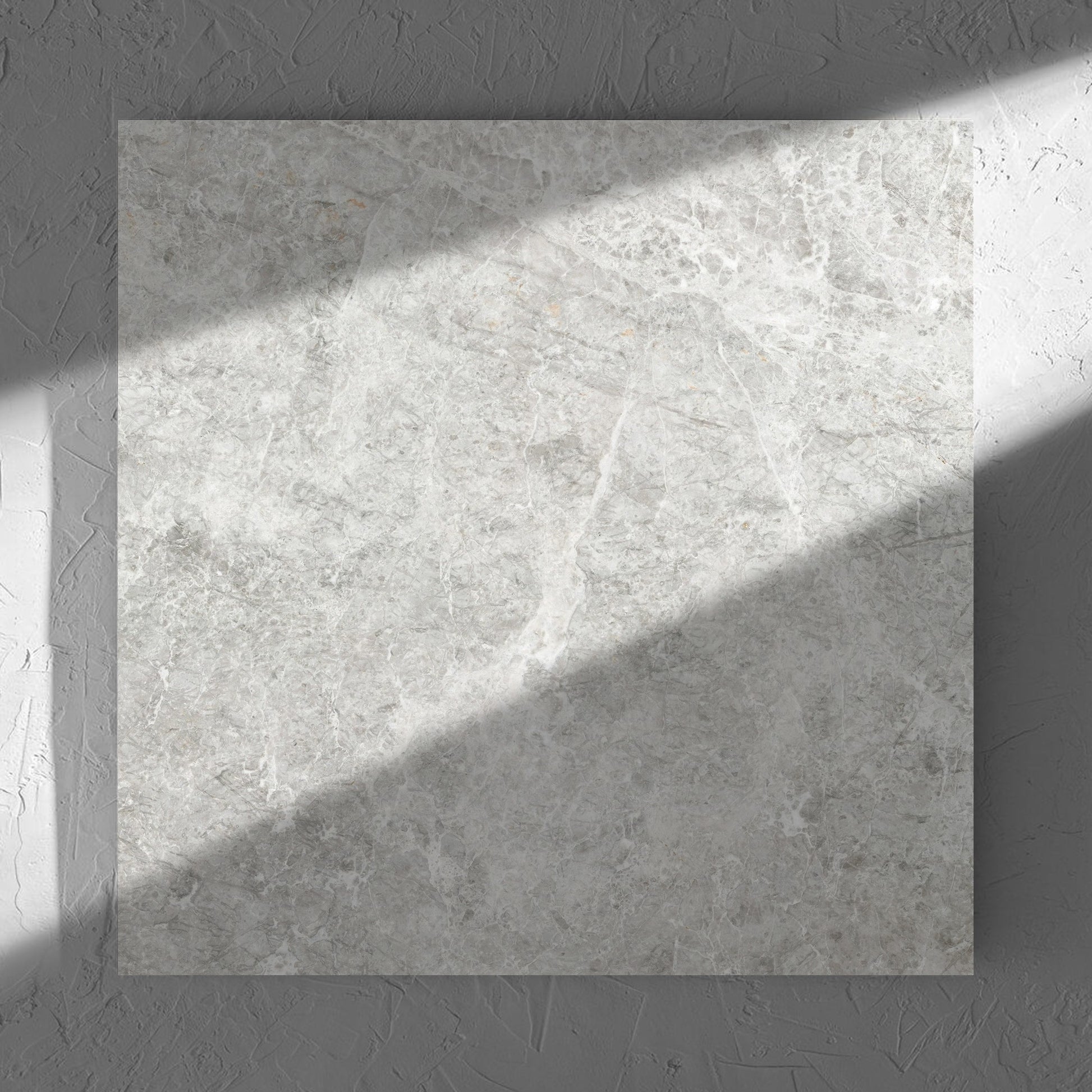 Antalya Beige Amber 600x600mm tile in soft natural window light, showing the matt surface