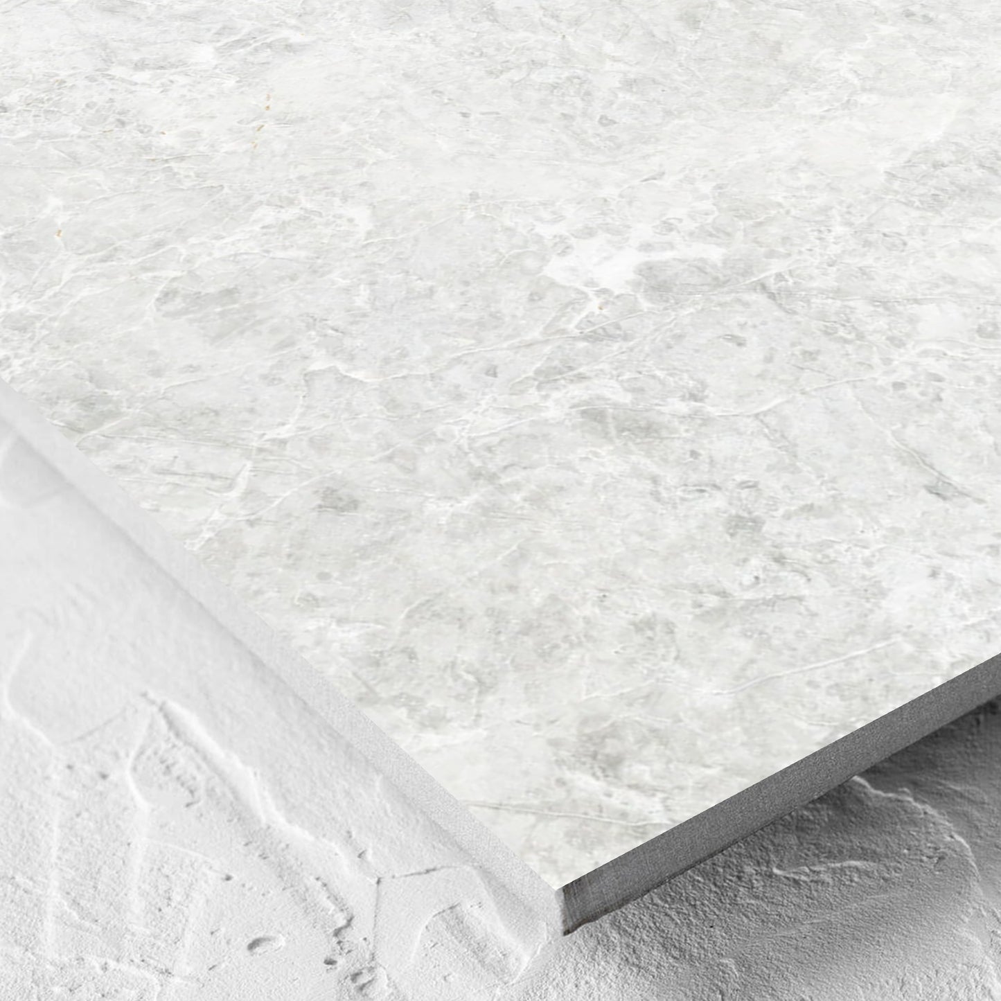 Corner close-up of the Antalya Bianco Matt 600x600mm tile showing the matt surface and the edge profile