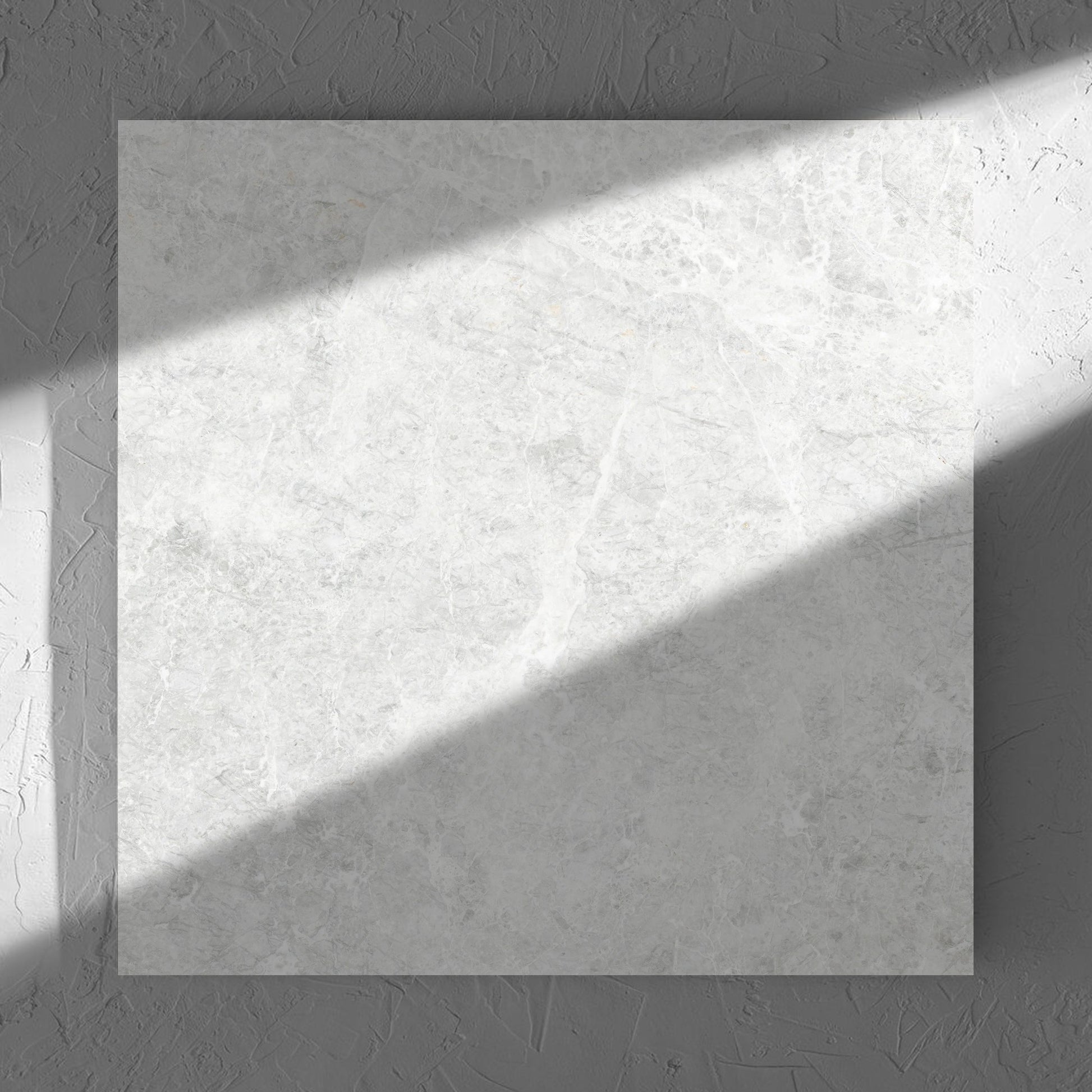 Antalya Bianco Matt 600x600mm tile in soft natural window light, showing the matt surface