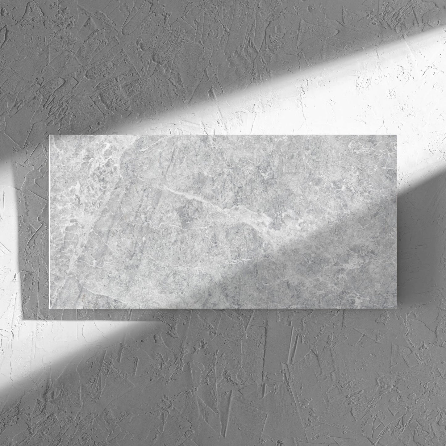 Antalya Silver Matt 300x600mm tile in soft natural window light, showing the matt surface