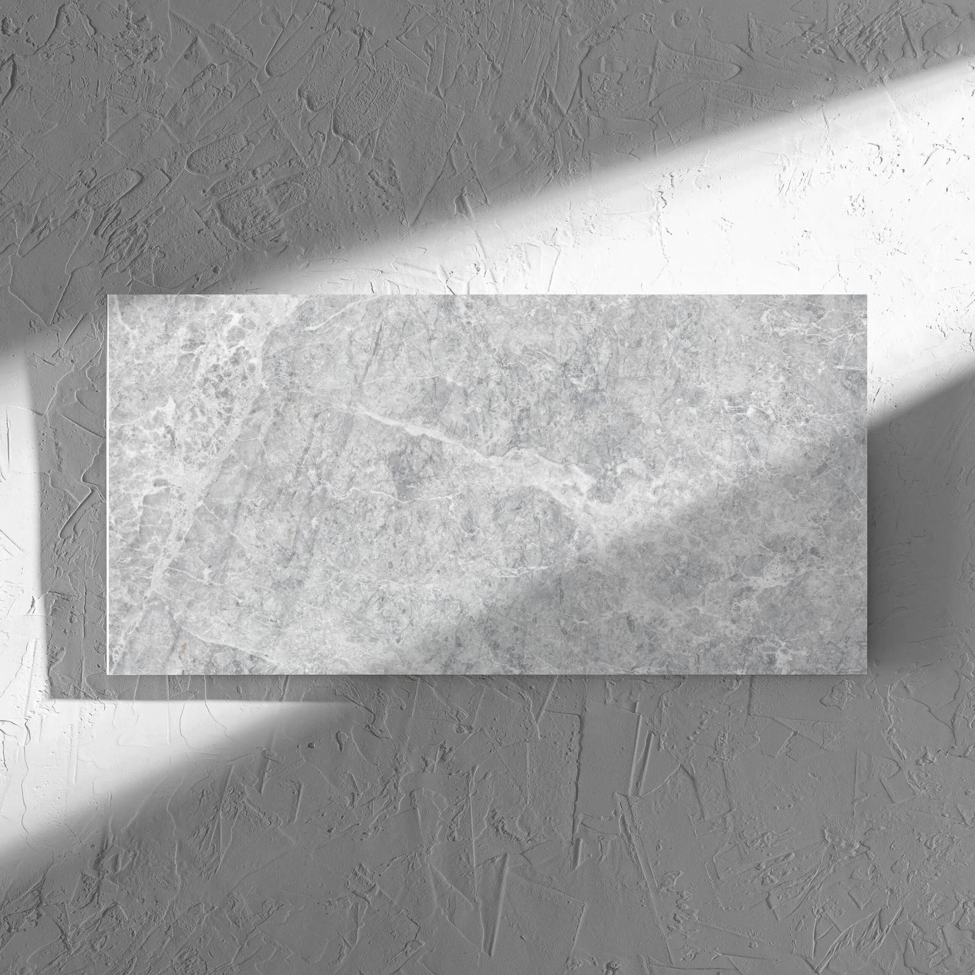 Antalya Silver Matt 300x600mm tile in soft natural window light, showing the matt surface