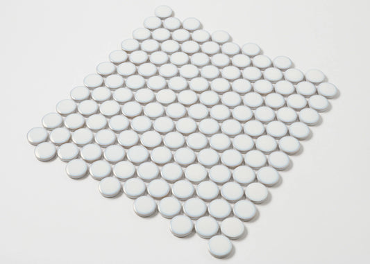 A flat-lay pack shot of Antique White Gloss Glazed Porcelain Penny Round 28mm Diameter mosaic tiles arranged in a diamond-shaped sheet showing their circular glossy finish.