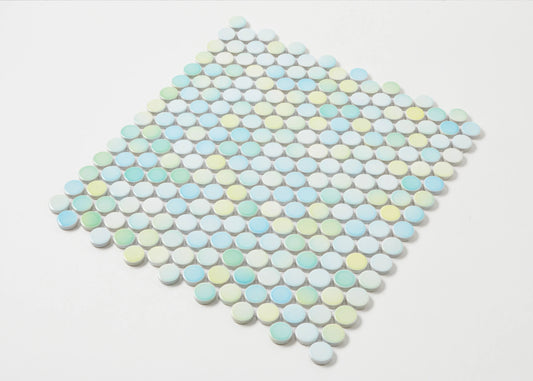 Pack shot of Aqua Mix Gloss Diameter Glazed Porcelain Penny Round 19mm tiles arranged in a diamond shape, showing pastel blue, green, and yellow glazed circular mosaic pieces.