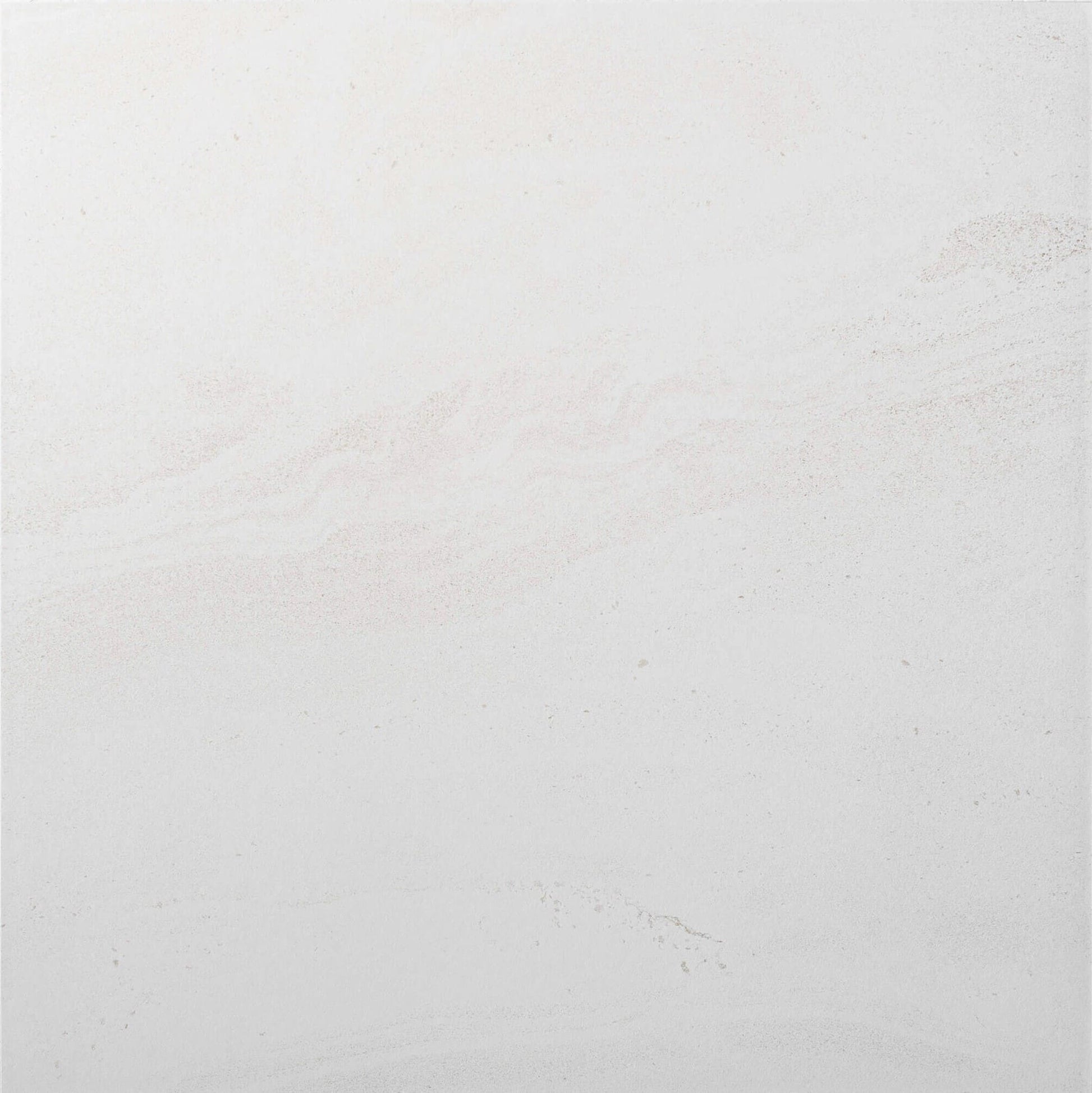 Close-up of Argyle Stone Talco Ext 450x450mm tile showing a smooth white surface with subtle warm beige veining and a matte stone finish.