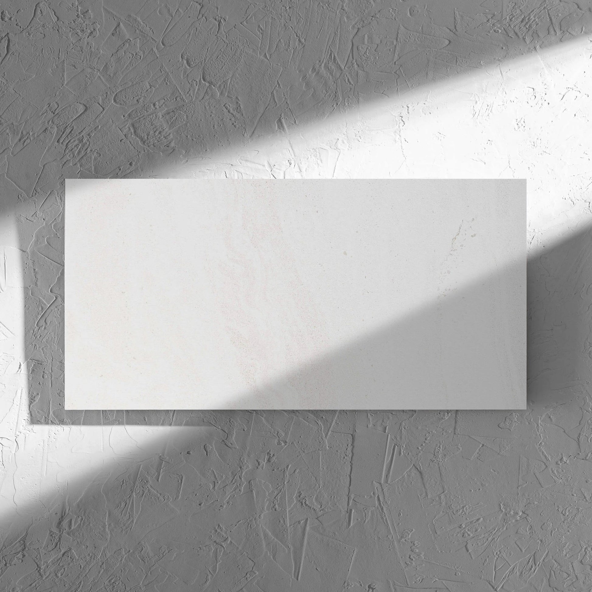 Argyle Stone Talco Lappato 300x600mm tile in soft natural window light, showing the tile surface