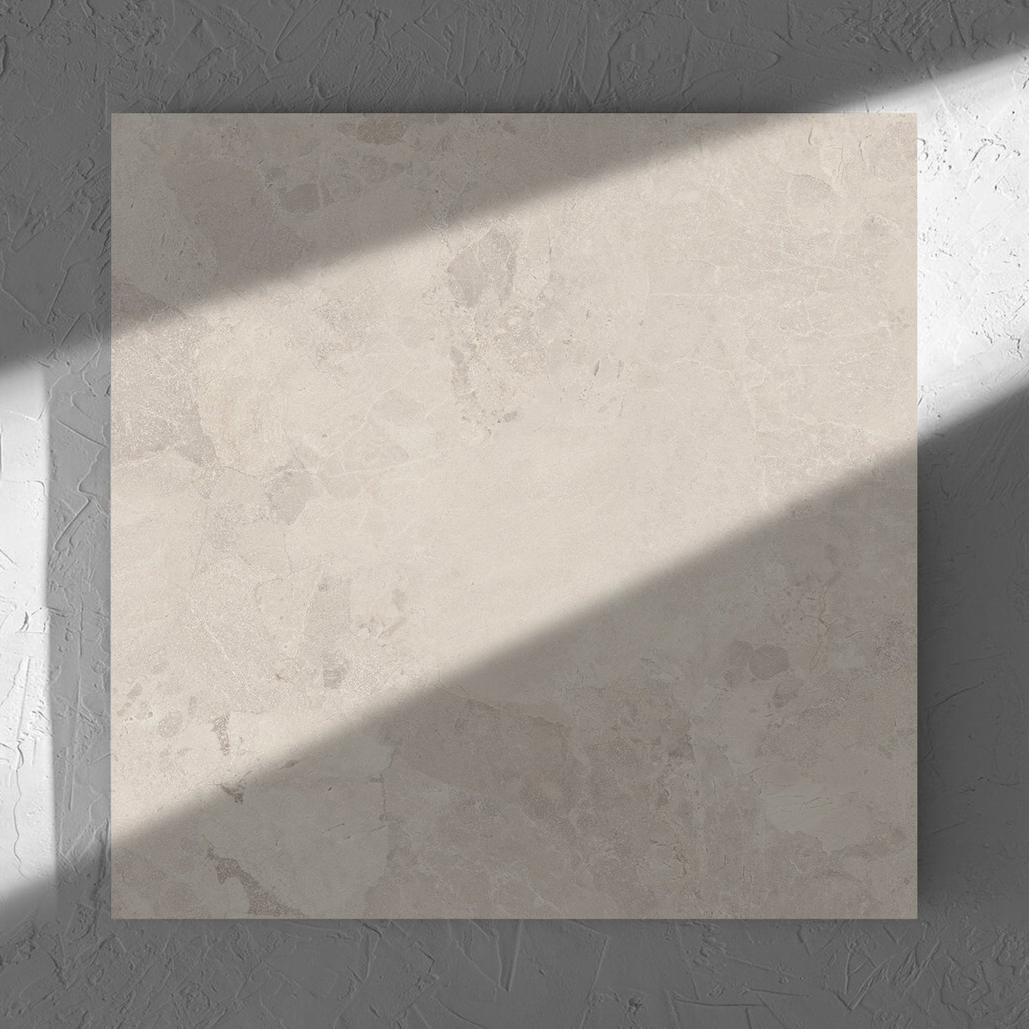 Aurelia Stone Ash Matt 600x600mm tile in soft natural window light, showing the matt surface