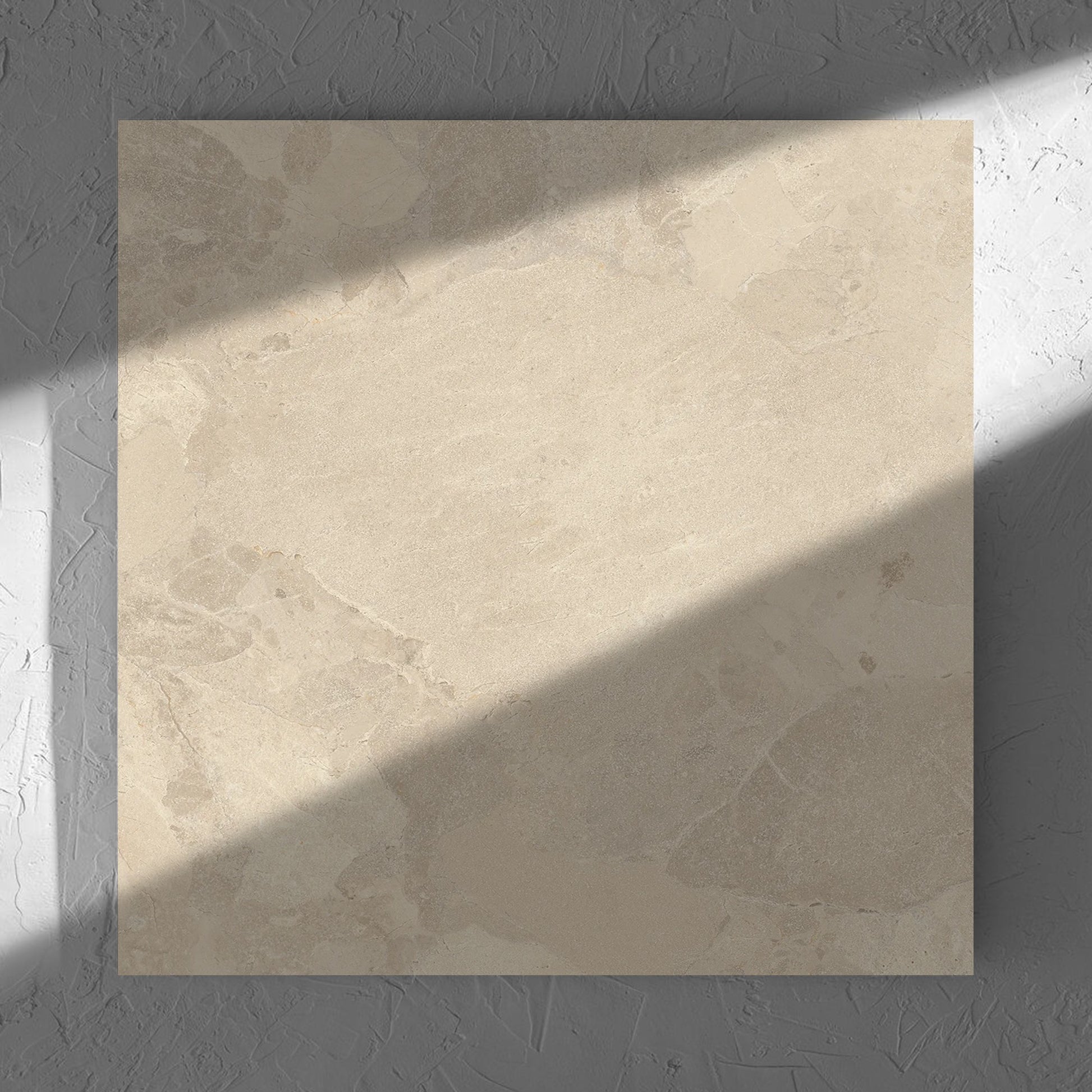 Aurelia Stone Beige Matt 600x600mm tile in soft natural window light, showing the matt surface
