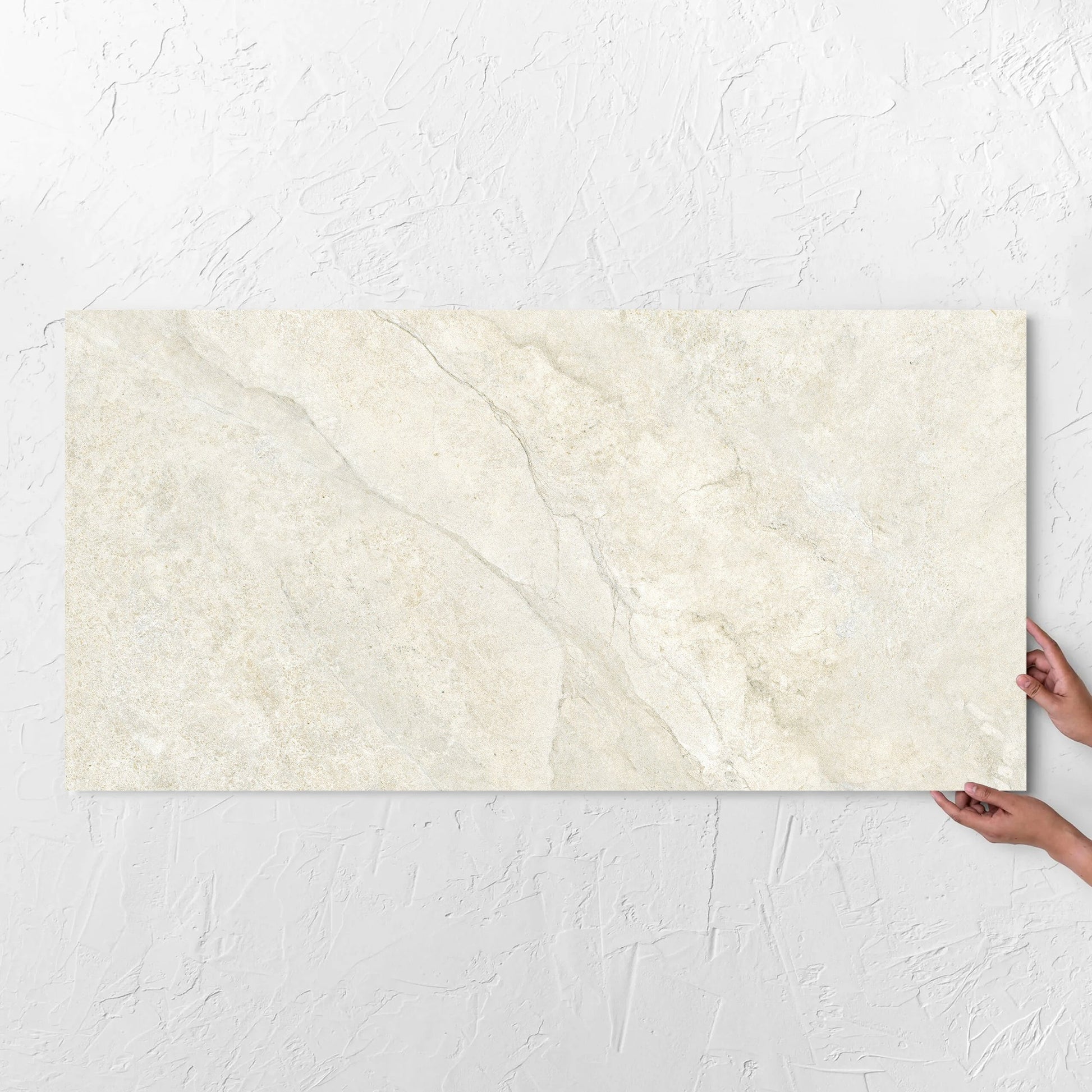 Lakestone Sand Matt 600x1200mm tile with hands