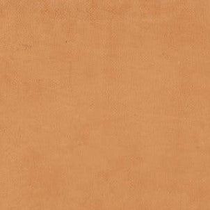 Close-up of Balance Orange Matt 600x600mm tile showing a smooth, warm terracotta-orange matte surface with subtle natural texture.