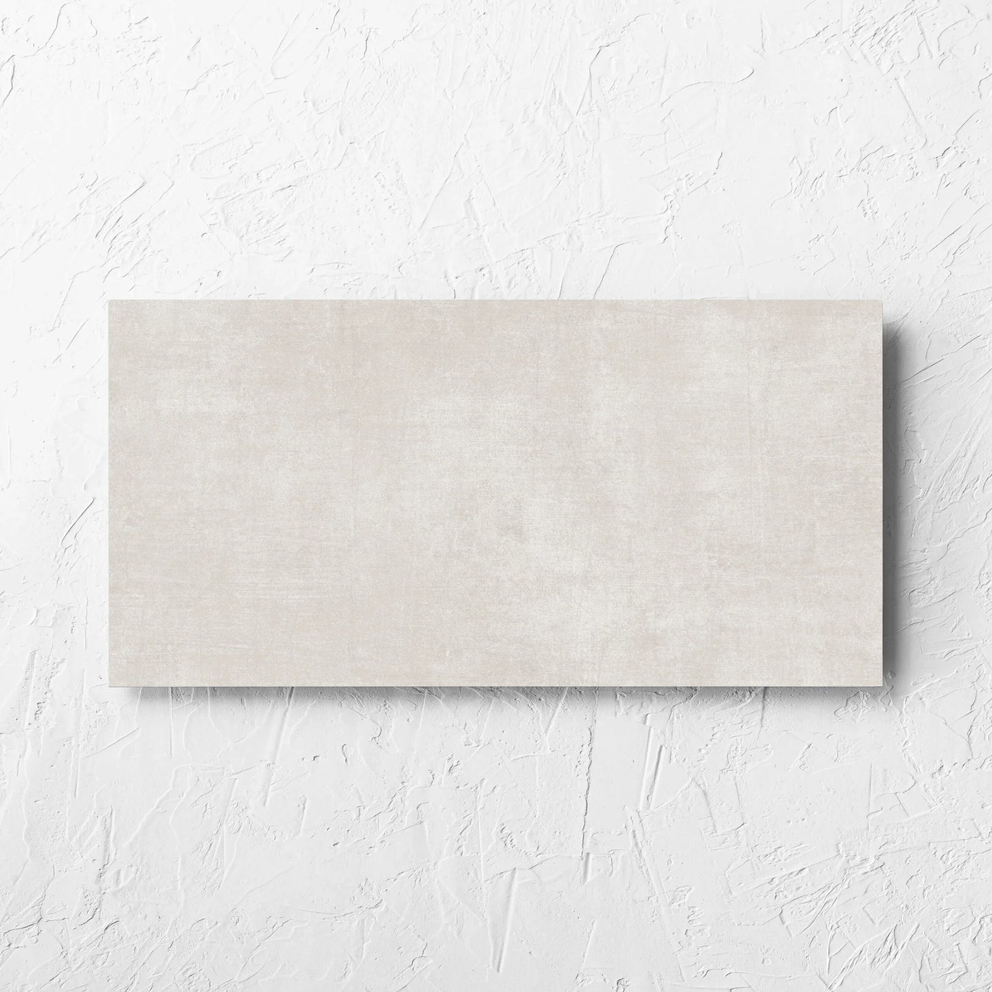 Bayside Champagne Natural Matt 300x600mm tile laid flat on a white rendered wall, showing the matt surface