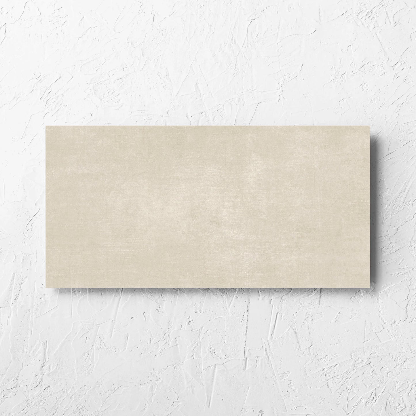 Bayside Sand Natural Matt 300x600mm tile laid flat on a white rendered wall, showing the matt surface