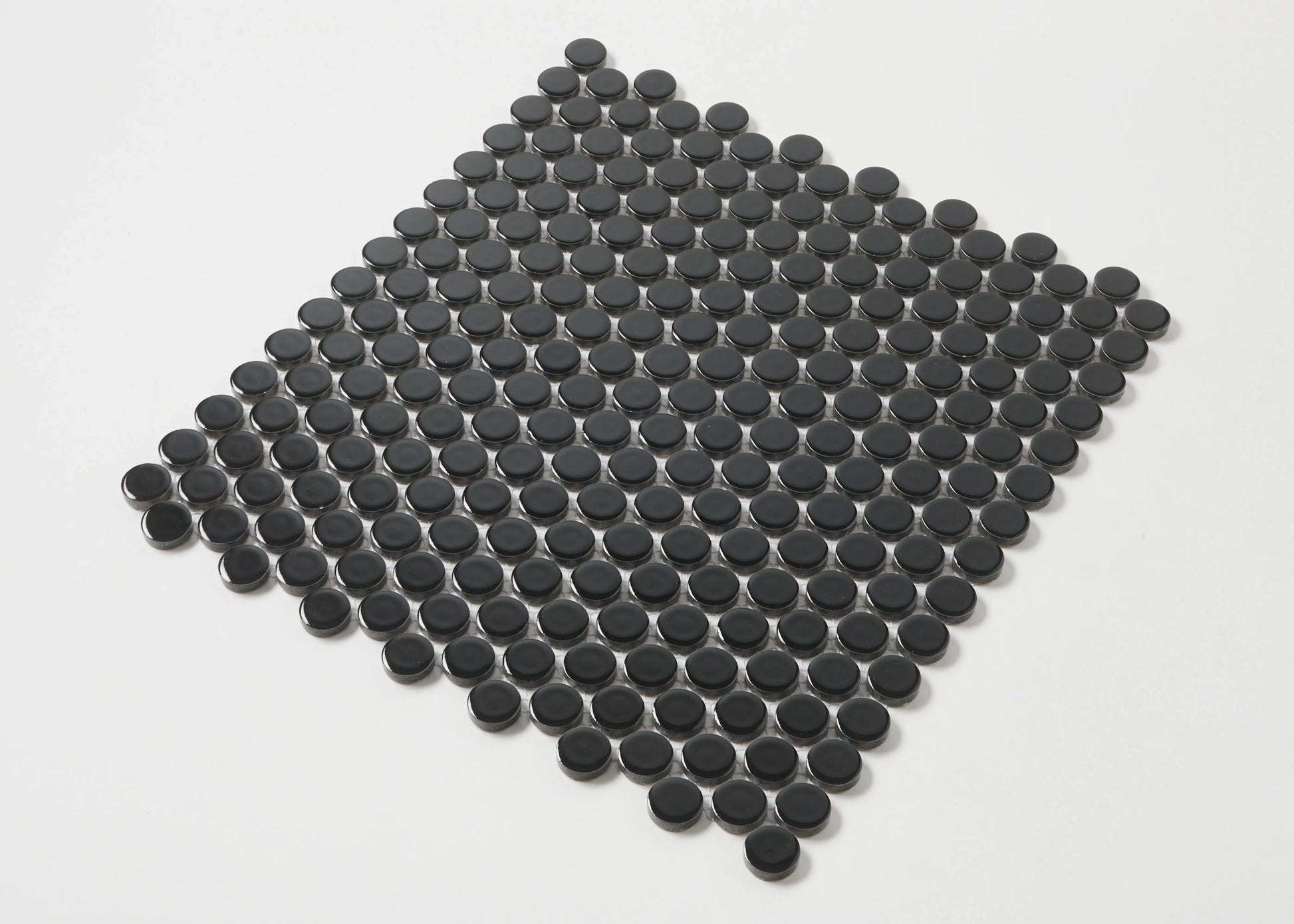 Black Gloss Diameter Glazed Porcelain Penny Round 19mm tiles arranged in a diamond-shaped mesh sheet, showing glossy circular black ceramic mosaic pieces on a white background.