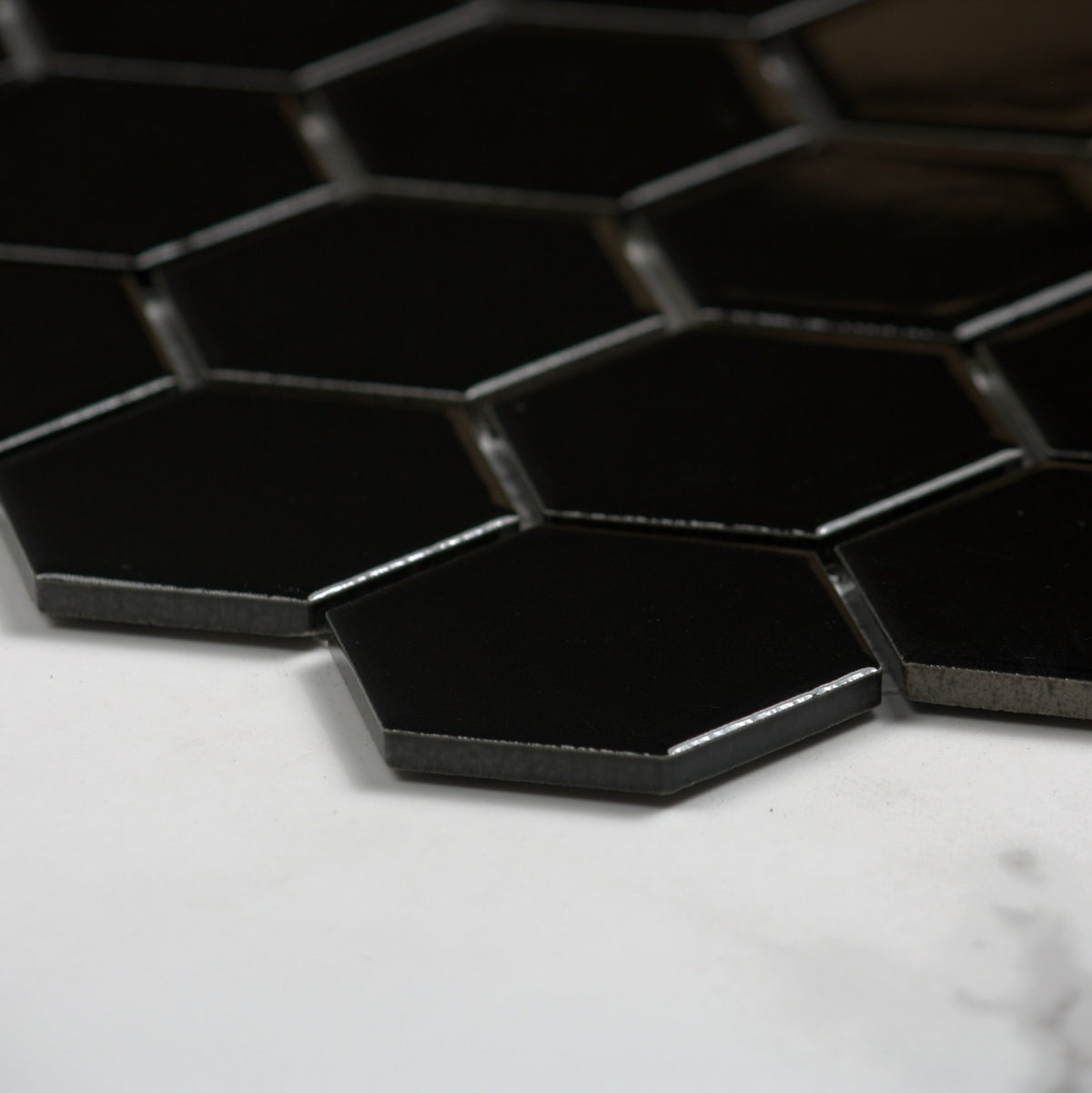 Black Gloss Porcelain Glazed Hexagon 51x59mm angle view