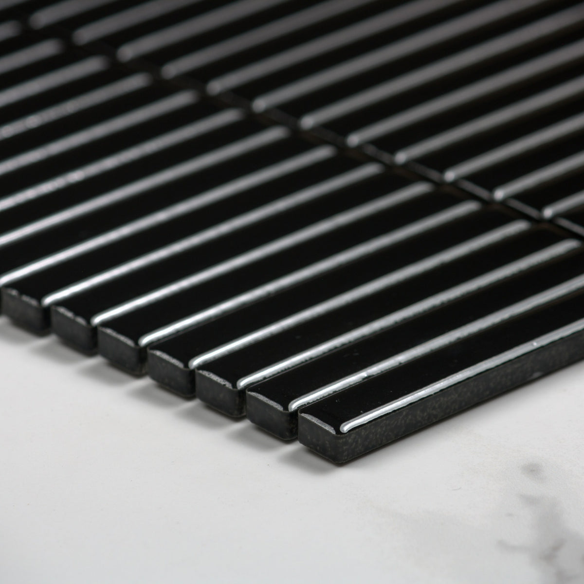 Black Gloss Porcelain Glazed KitKat 12x92mm angle view