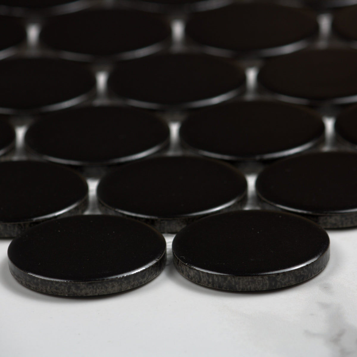 Black Matt Porcelain Glazed Penny Round 48mm angle view
