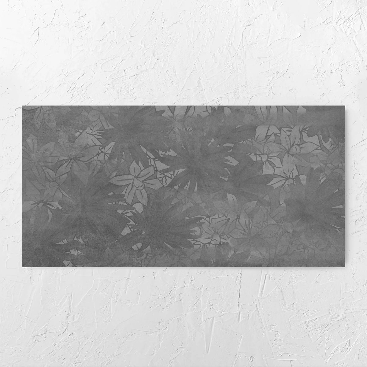 Botanica Lotus Decor 600x1200mm tile laid flat on a white rendered wall, showing the matt surface